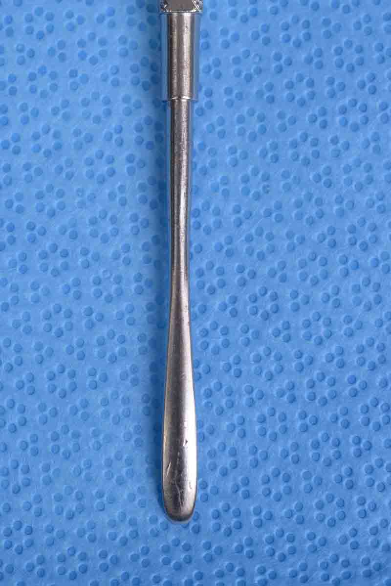 This is a multipurpose tool used in many procedures, commonly to elevate the periosteum from bone in confined spaces. It is double ended and typically has a rounded handle with two slightly curved, tear-drop shaped tips. One tip is blunt while the other is sharp. The curvature of the tips allows for the navigation of contours, such as when elevating the periosteum during repair of orbital floor fractures.