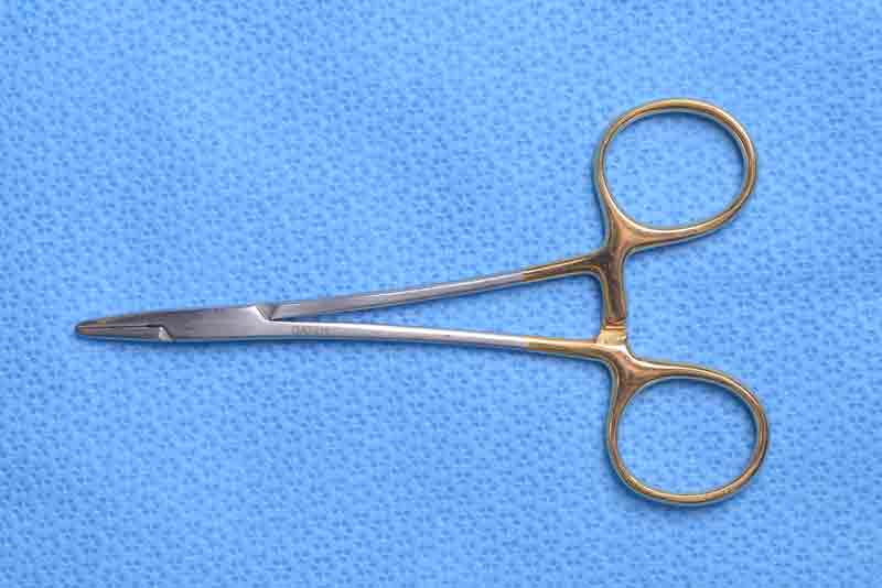 This ring-handle needle holder is used when significant force is needed to pass a needle or when long/deep passes are made through sub-cutaneous tissues.  Often a larger needle, which is at risk for popping off the Castroviejo, is used for these passes.  The brow fixation during posterior hairline browplasty is placed using the Webster Needle Holder.  They are available with smoother or serrated jaws.